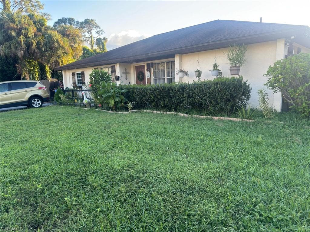 411 Roosevelt Ave, Lehigh Acres, FL 33936-3
