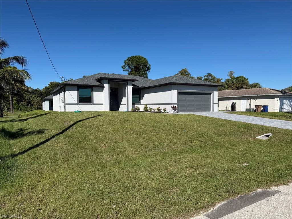 817 Atherton Ave, Lehigh Acres, FL 33971-3