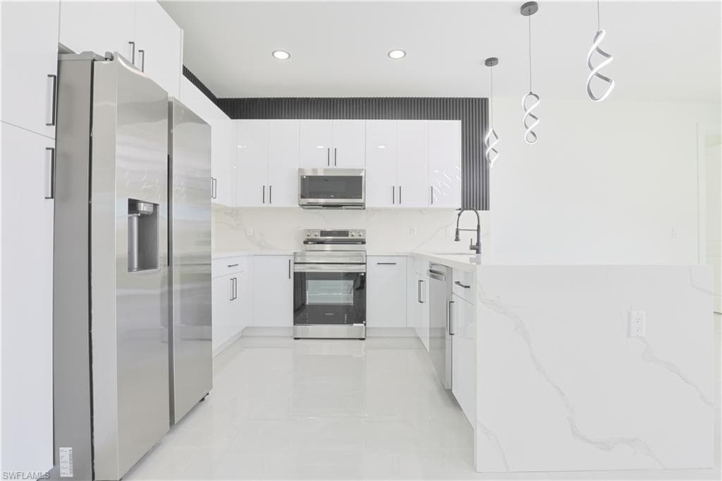 703 Otto Ave N, Lehigh Acres, FL 33971-8