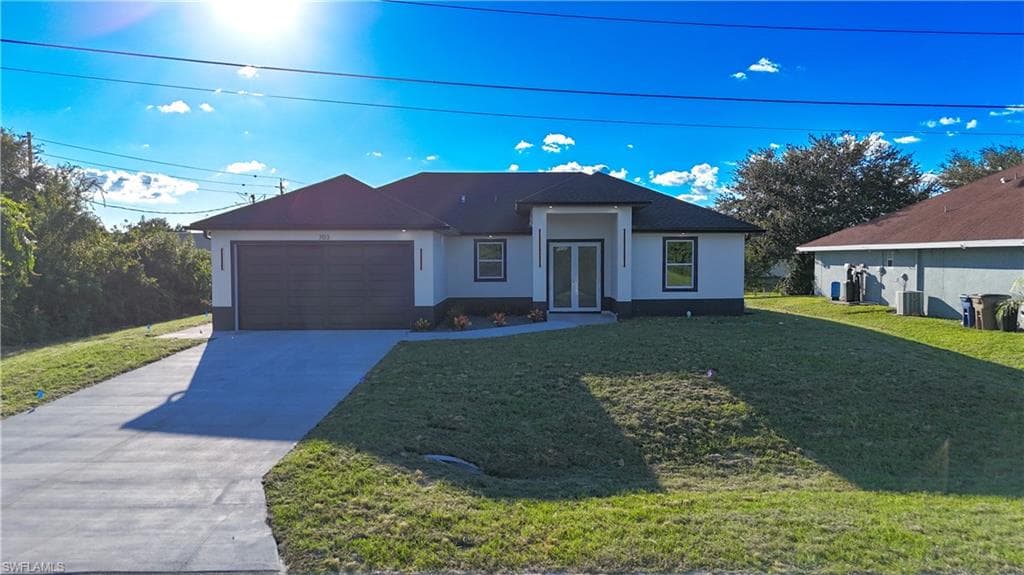 703 Otto Ave N, Lehigh Acres, FL 33971-1