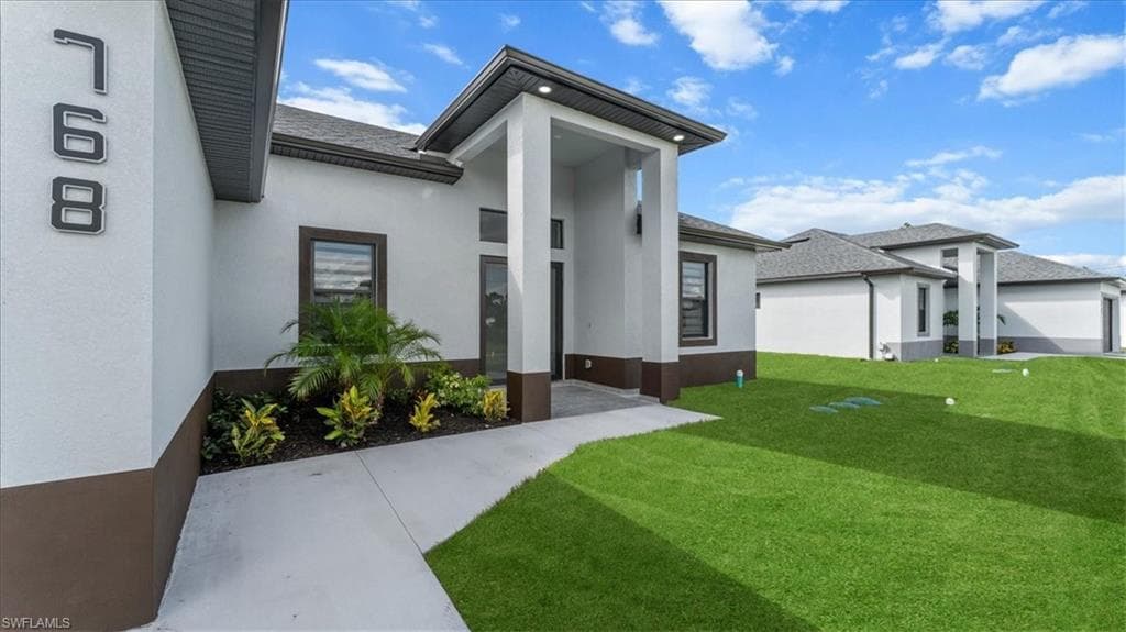 768 Roma Ave S, Lehigh Acres, FL 33974-3