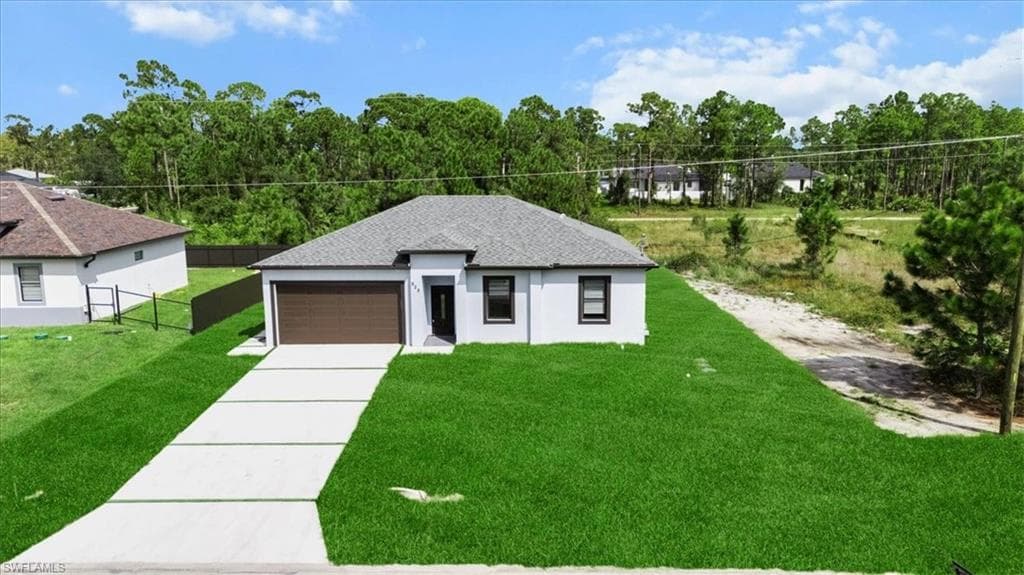 925 Winters St E, Lehigh Acres, FL 33974-3