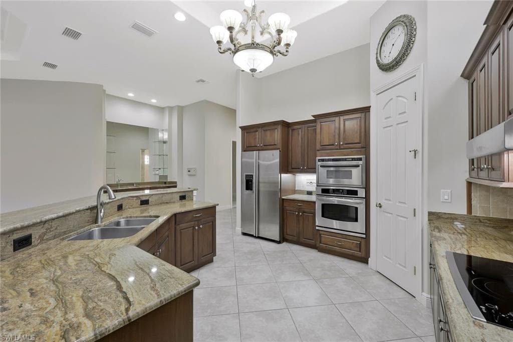 5616 Hammock Isles Dr, Naples, FL 34119-8