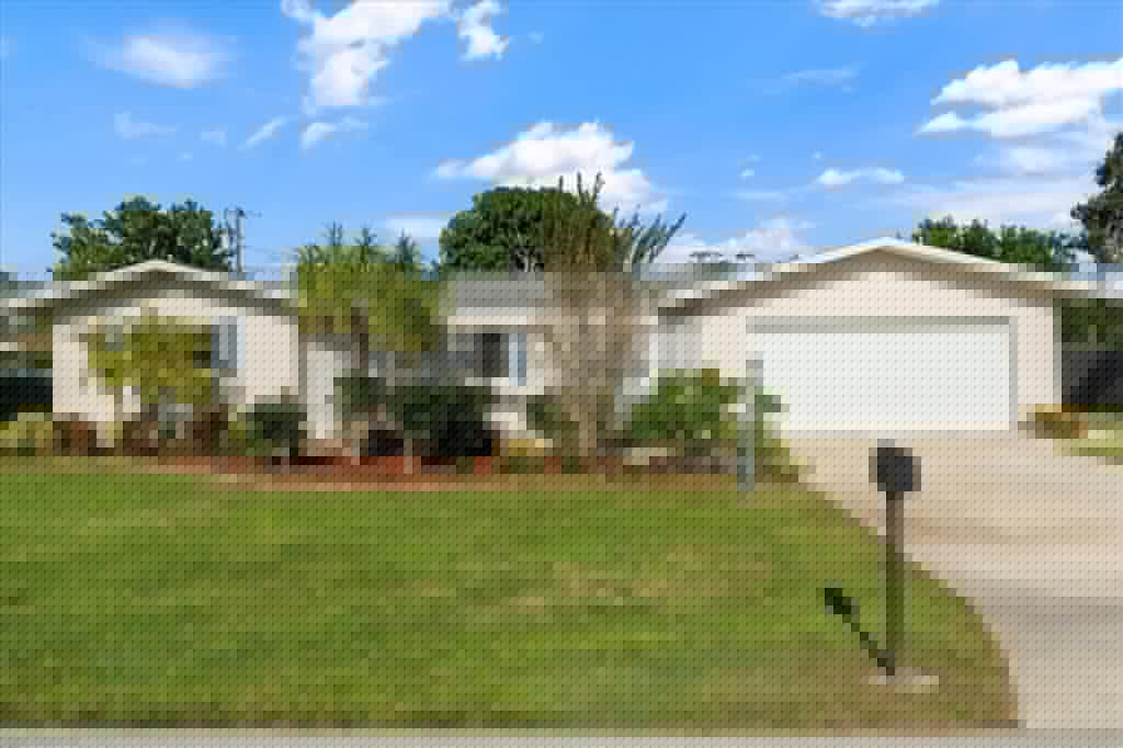 1502 Canal St, Lehigh Acres, FL 33936-1