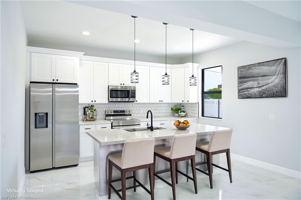 932 Maddock St E, Lehigh Acres, FL 33974-3