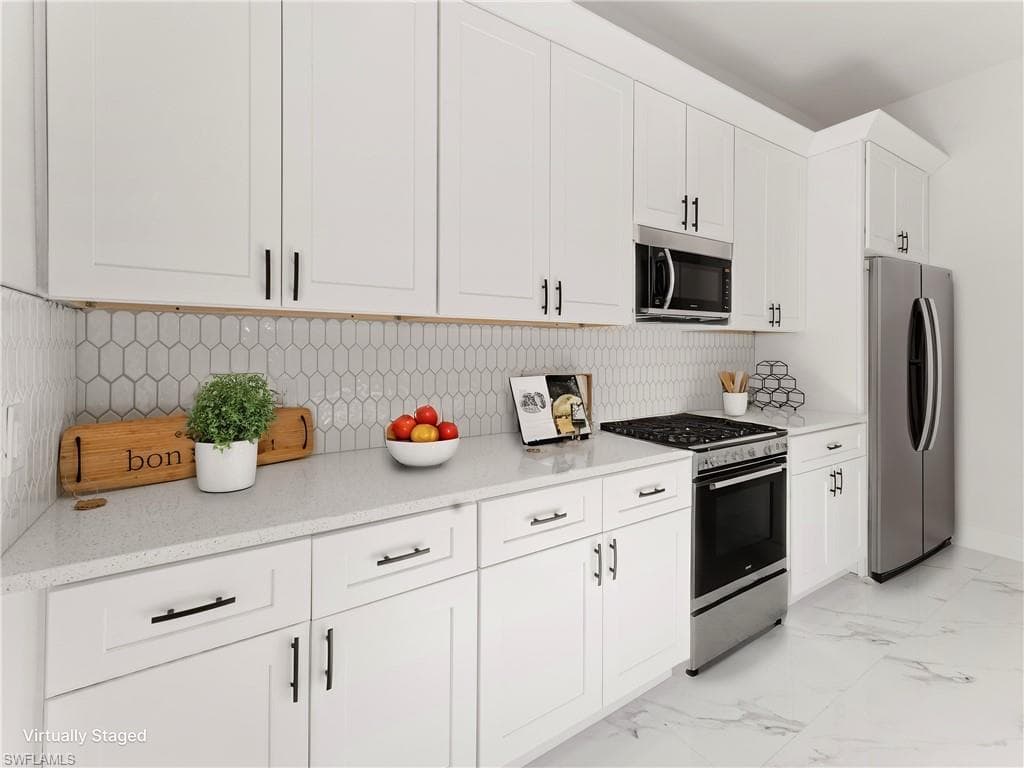 932 Maddock St E, Lehigh Acres, FL 33974-4