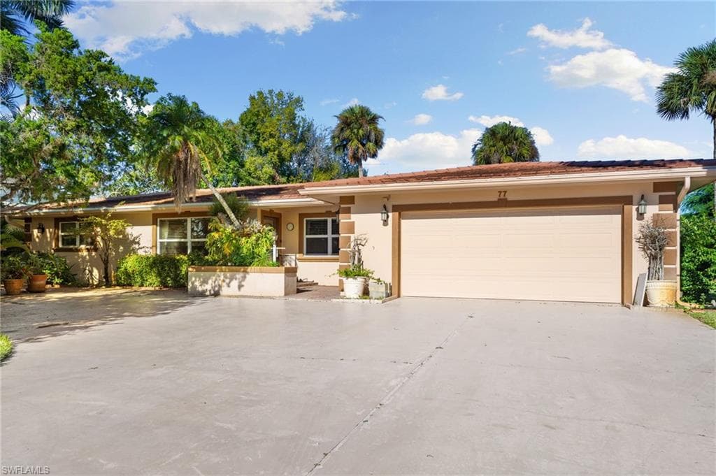 77 Cypress Point Dr, Naples, FL 34105-9