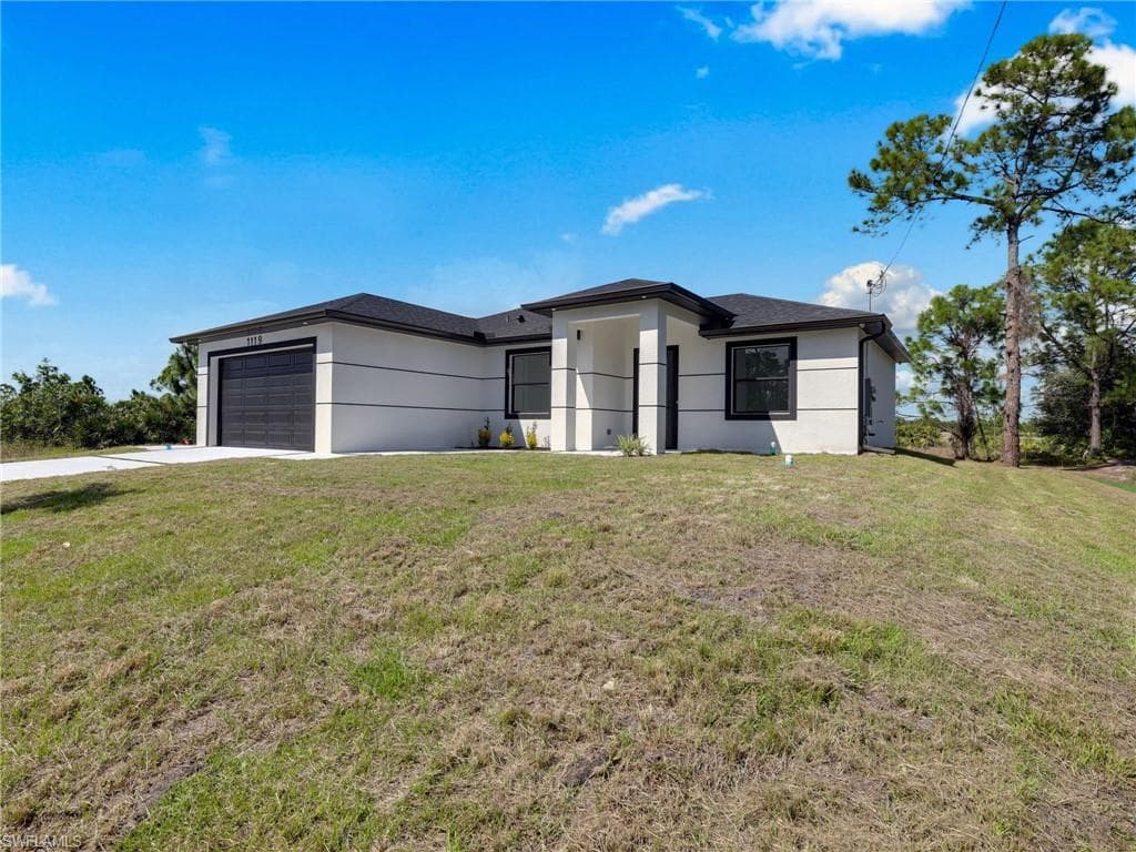 1119 Earhart St E, Lehigh Acres, FL 33974-5