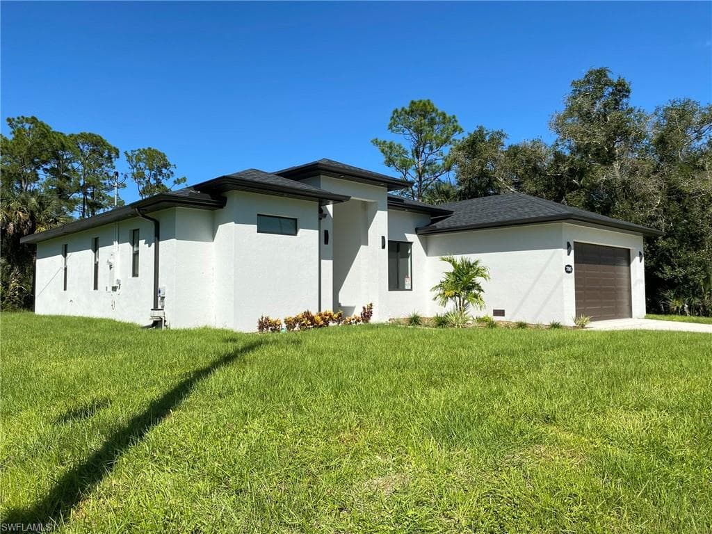 706 W 10th St, Lehigh Acres, FL 33972-4