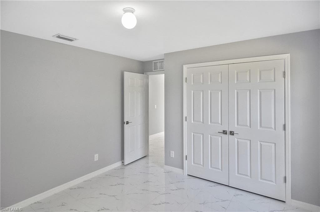 3306 1st St SW, Lehigh Acres, FL 33976-18