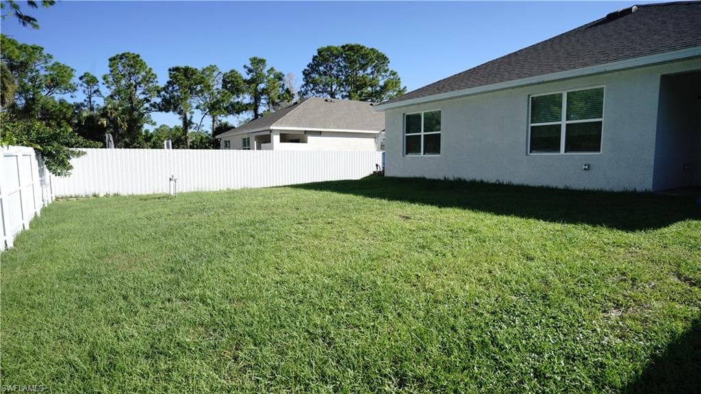 3301 Joan Ave N, Lehigh Acres, FL 33971-3