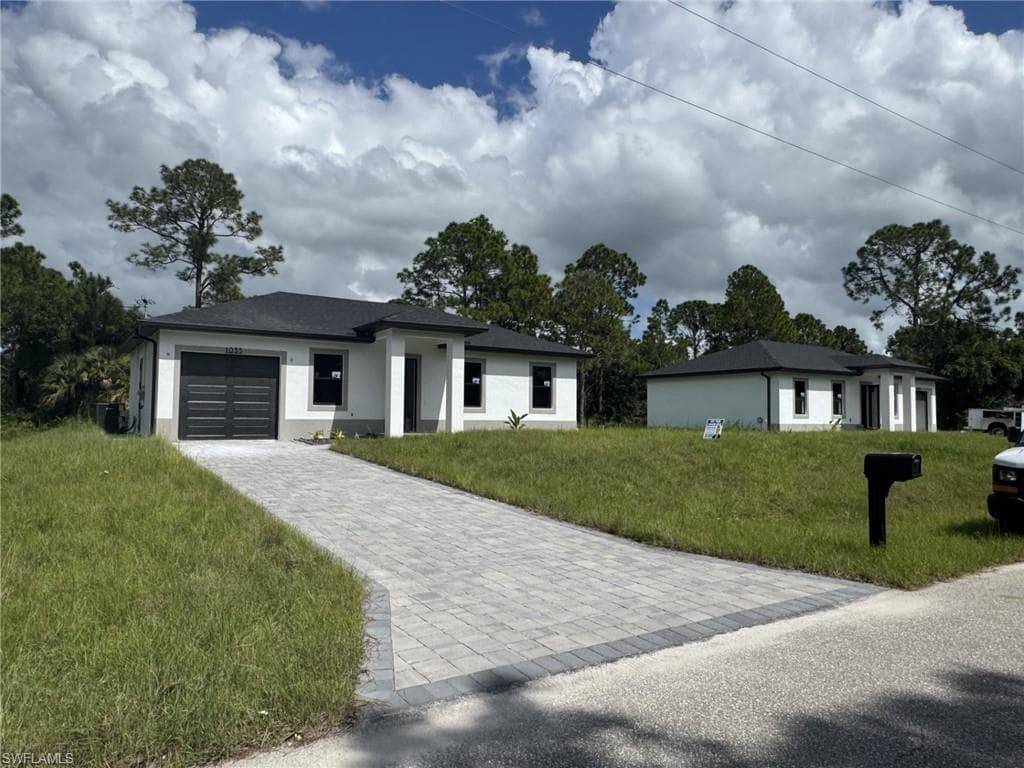 1127 Chipley St, Lehigh Acres, FL 33974-2