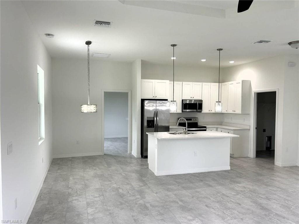 425 Mercedes Ct, Lehigh Acres, FL 33972-3