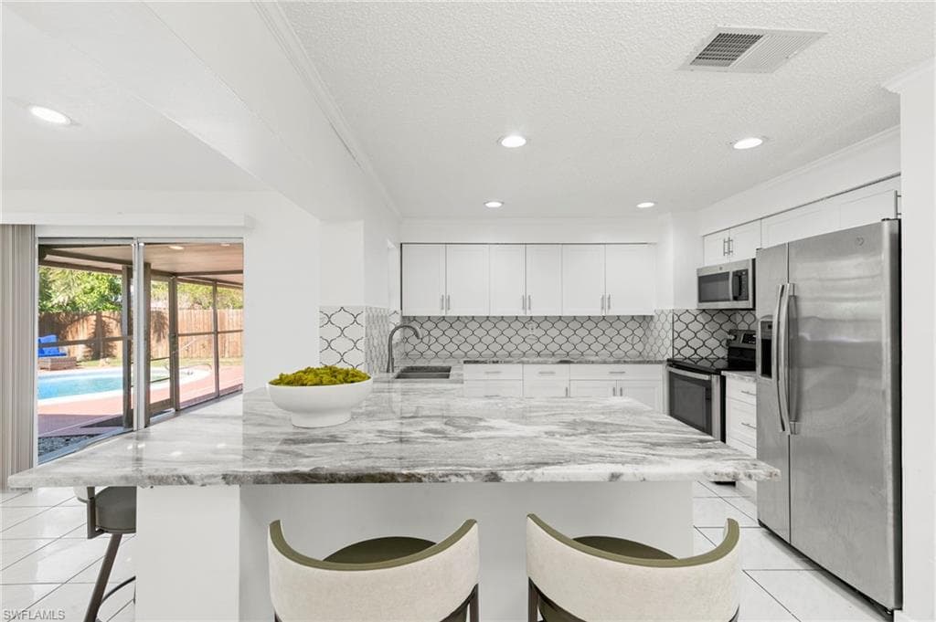 4220 Pearl Harbor Dr, Naples, FL 34112-7