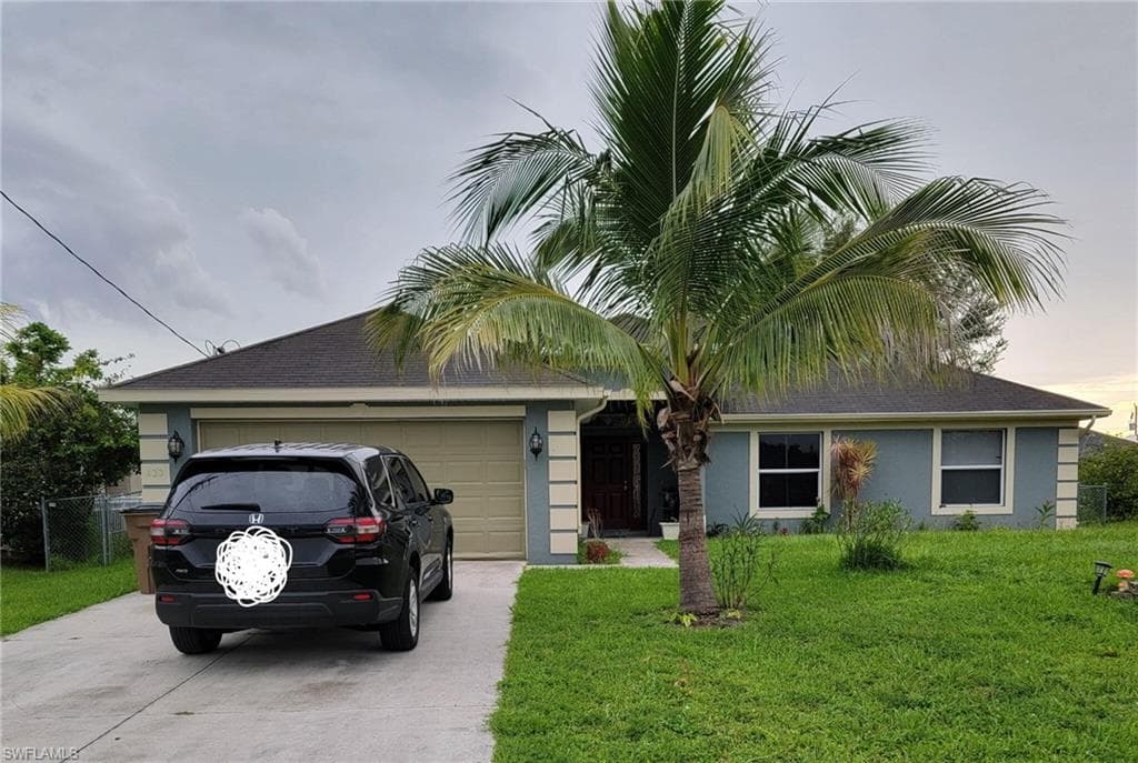 423 Windermere Dr, Lehigh Acres, FL 33972-3