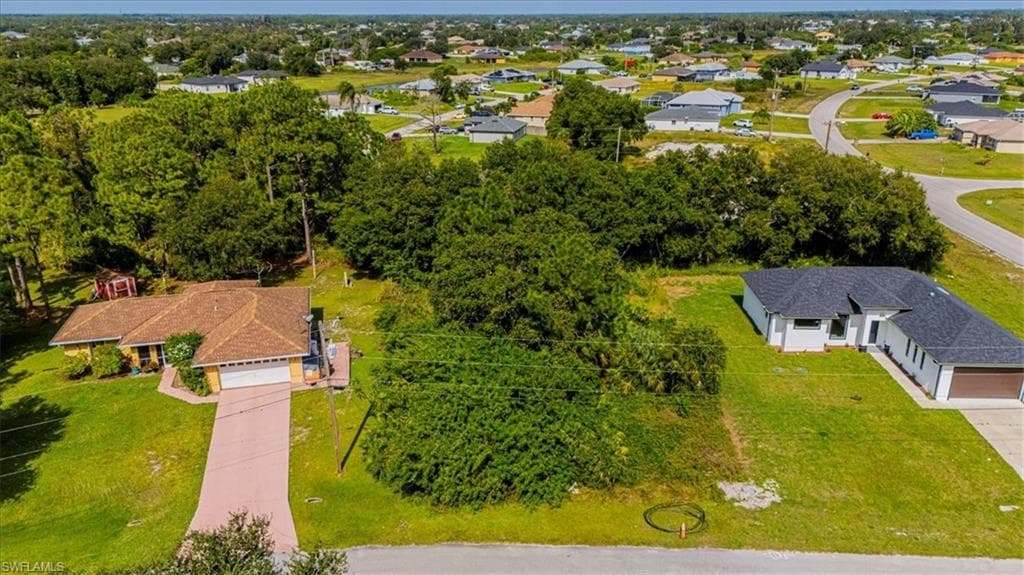 102 Parish Dr, Lehigh Acres, FL 33974-2