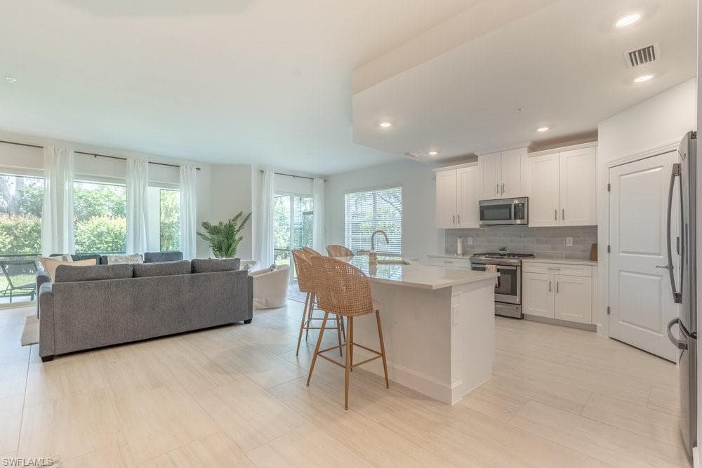 16903 Fairgrove Way 102, Naples, FL 34110-4