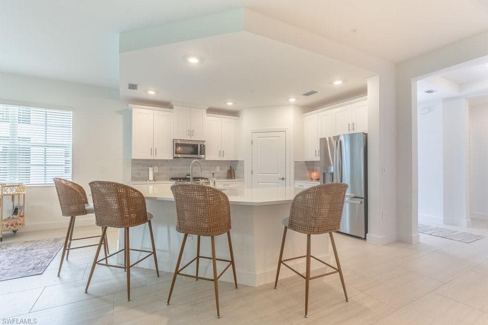 16903 Fairgrove Way 102, Naples, FL 34110-5