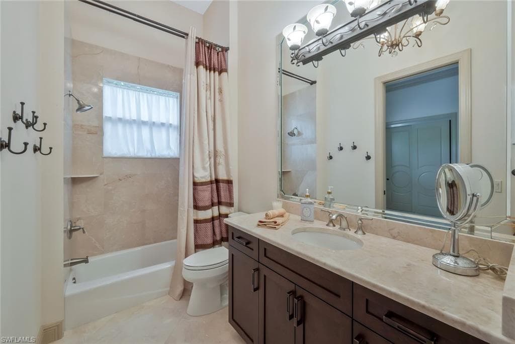 5869 Hammock Isles Cir, Naples, FL 34119-27