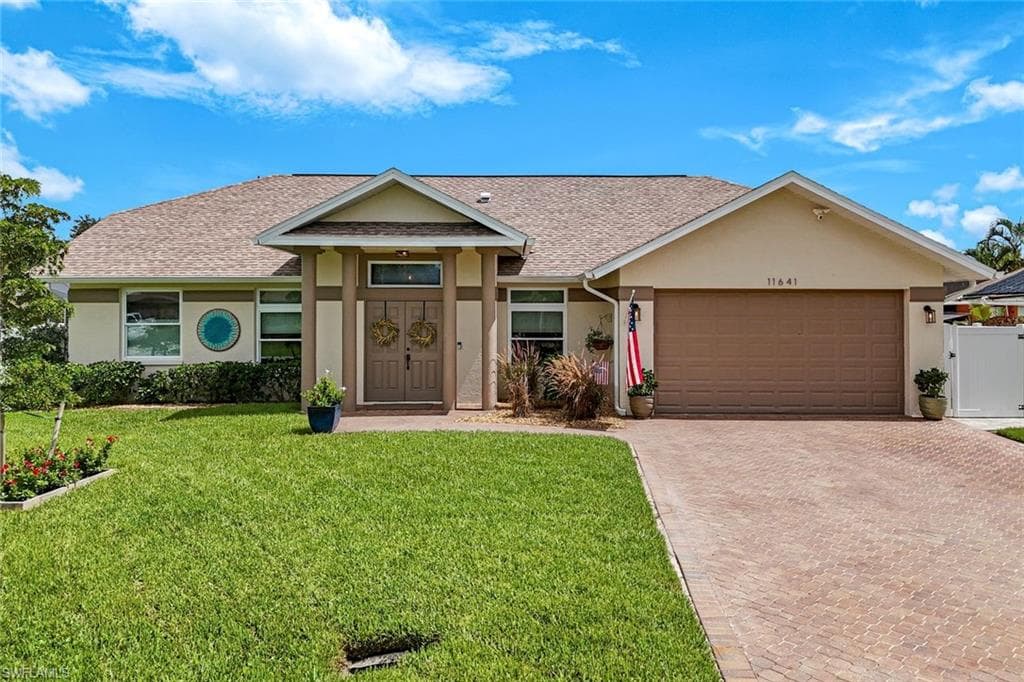 11641 Red Hibiscus Dr, Bonita Springs, FL 34135-1