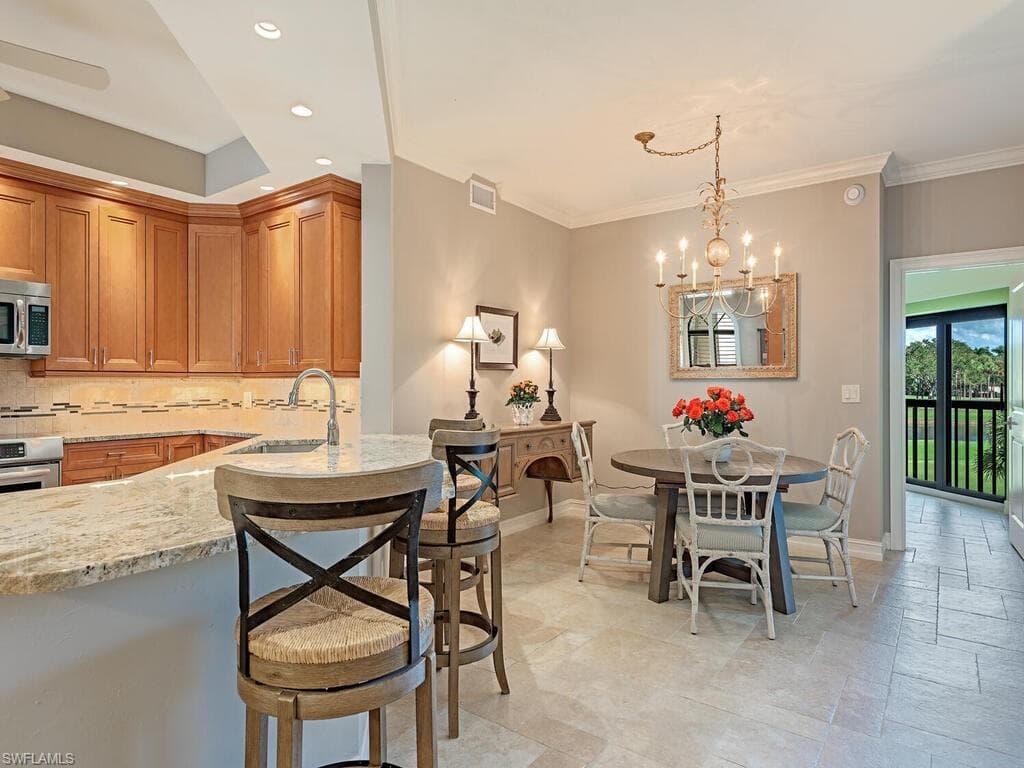 7032 Pelican Bay Blvd E202, Naples, FL 34108-5