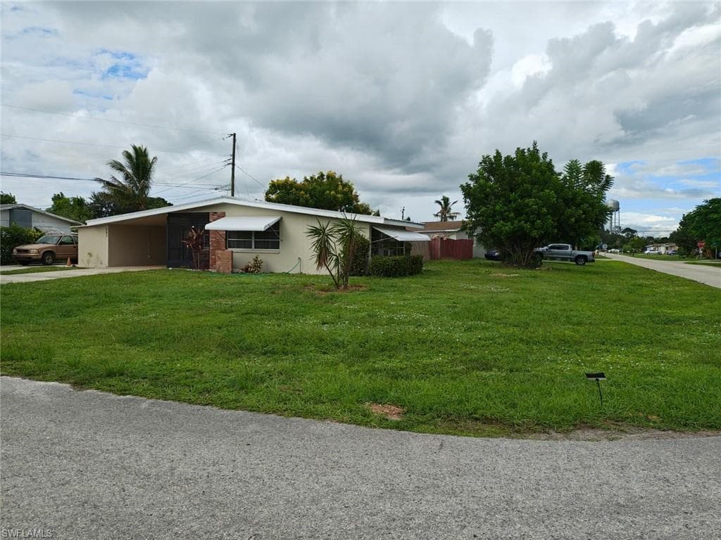 801 Perry Ave, Lehigh Acres, FL 33936-2