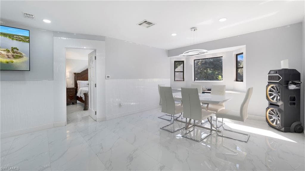 410 11th St NW, Naples, FL 34120-9