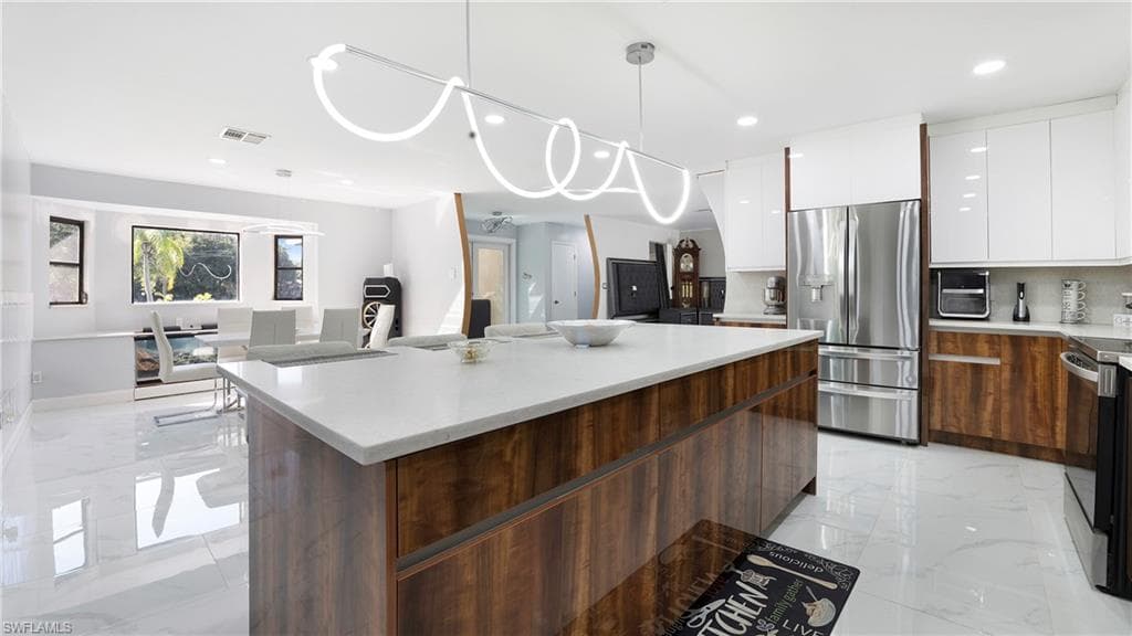 410 11th St NW, Naples, FL 34120-26