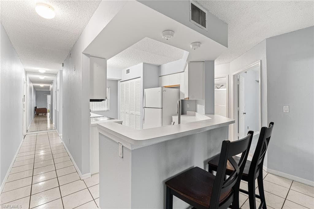 161 Wading Bird Cir L101, Naples, FL 34110-7