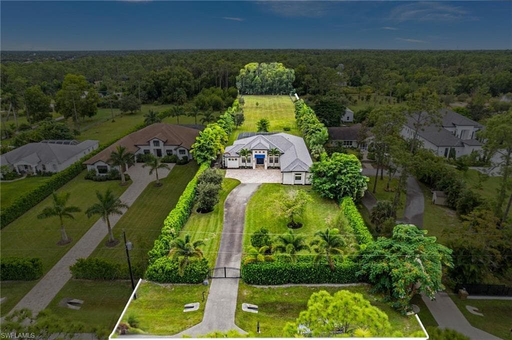 5710 Spanish Oaks Ln, Naples, FL 34119-3