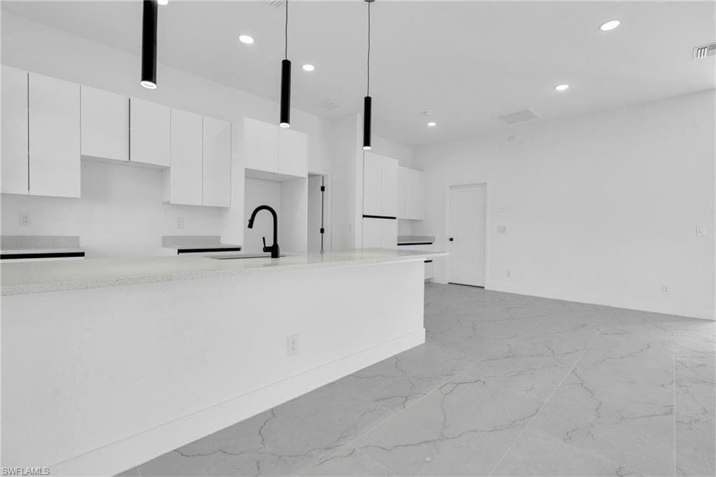 1133 Hatton Ave S, Lehigh Acres, FL 33974-6