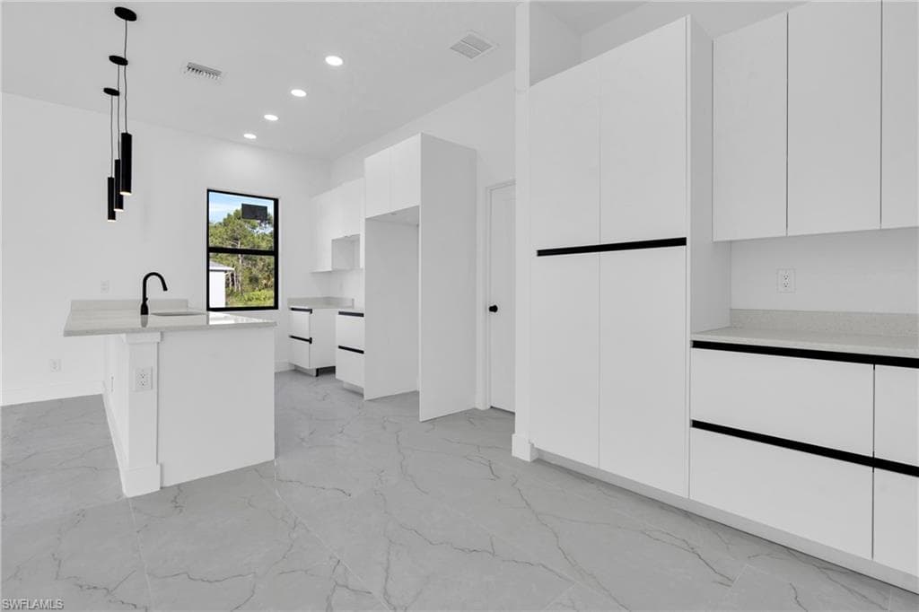 1133 Hatton Ave S, Lehigh Acres, FL 33974-7