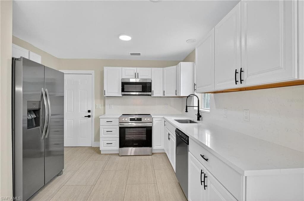 2801 7th St SW, Lehigh Acres, FL 33976-9