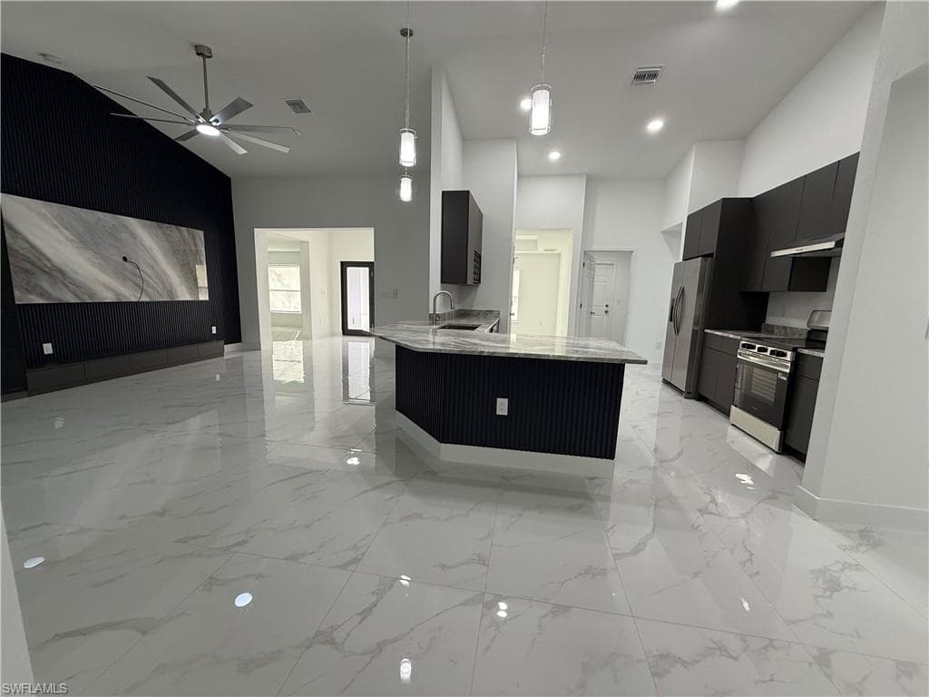 616 Plumosa Ave, Lehigh Acres, FL 33972-5