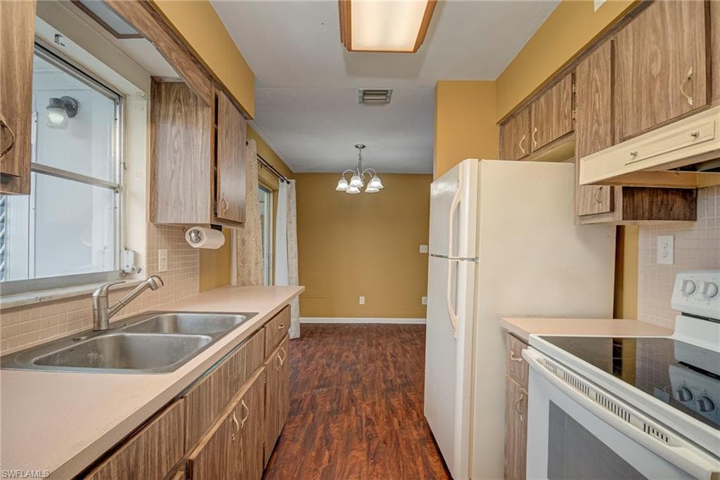 326 Canyon Dr N, Lehigh Acres, FL 33936-9