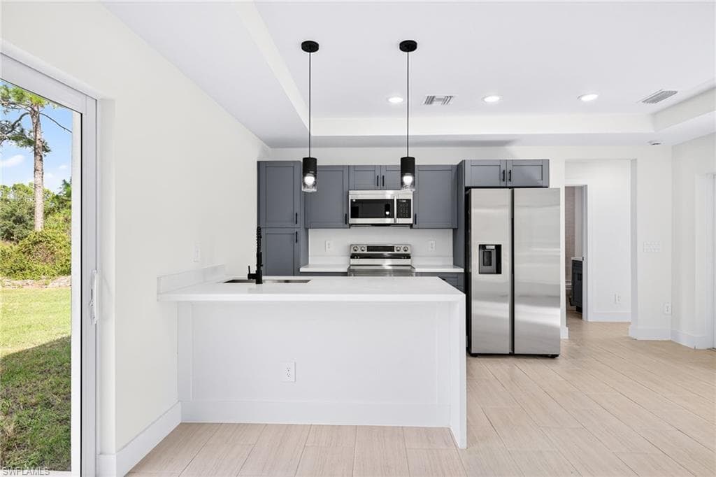 1141 Deauville St E, Lehigh Acres, FL 33974-6