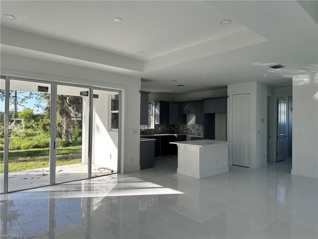 718 Chattman St E, Lehigh Acres, FL 33974-3