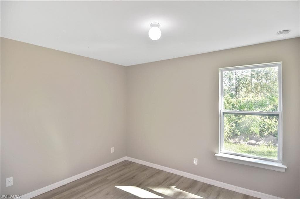 902 Lytle St E, Lehigh Acres, FL 33974-9