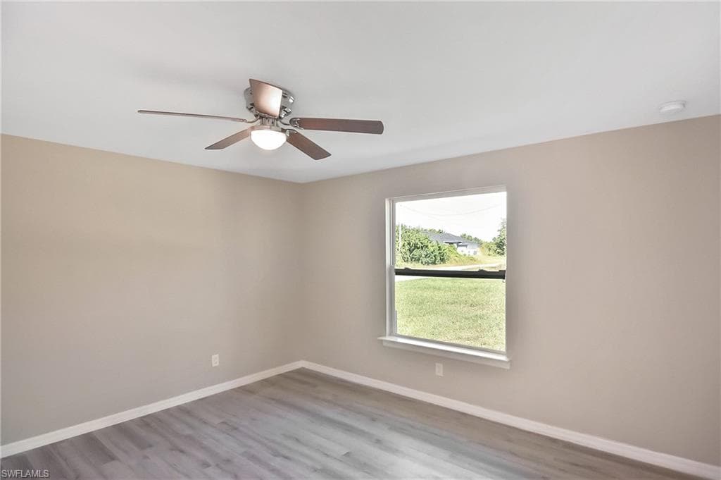 902 Lytle St E, Lehigh Acres, FL 33974-18