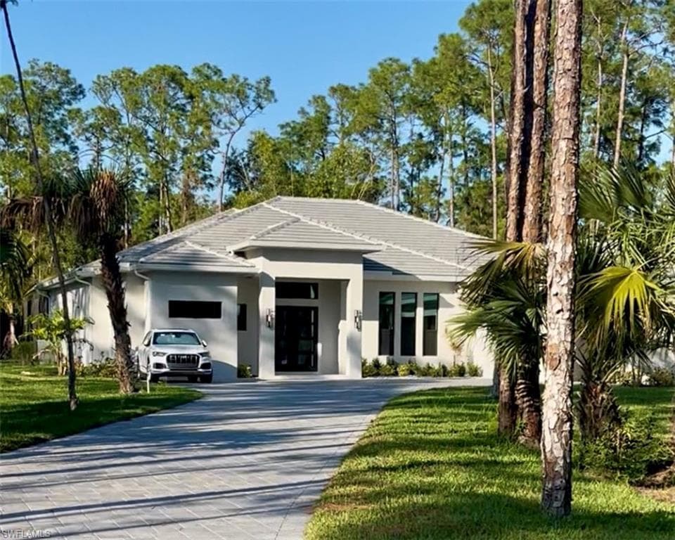 5041 Mahogany Ridge Dr, Naples, FL 34119-4