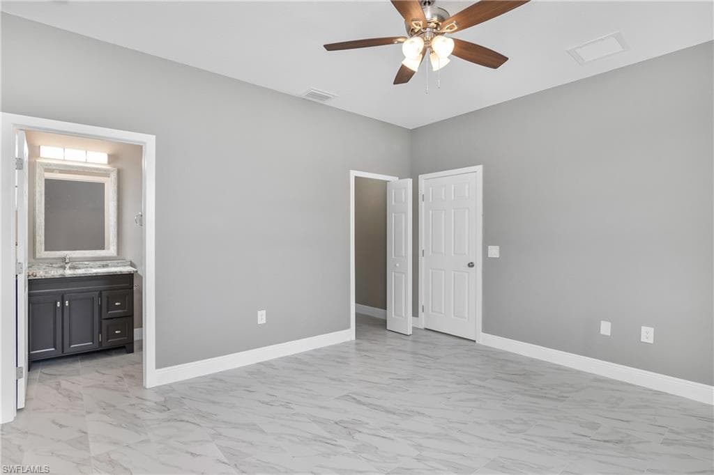 113-115 Gilbert Ave S, Lehigh Acres, FL 33973-8