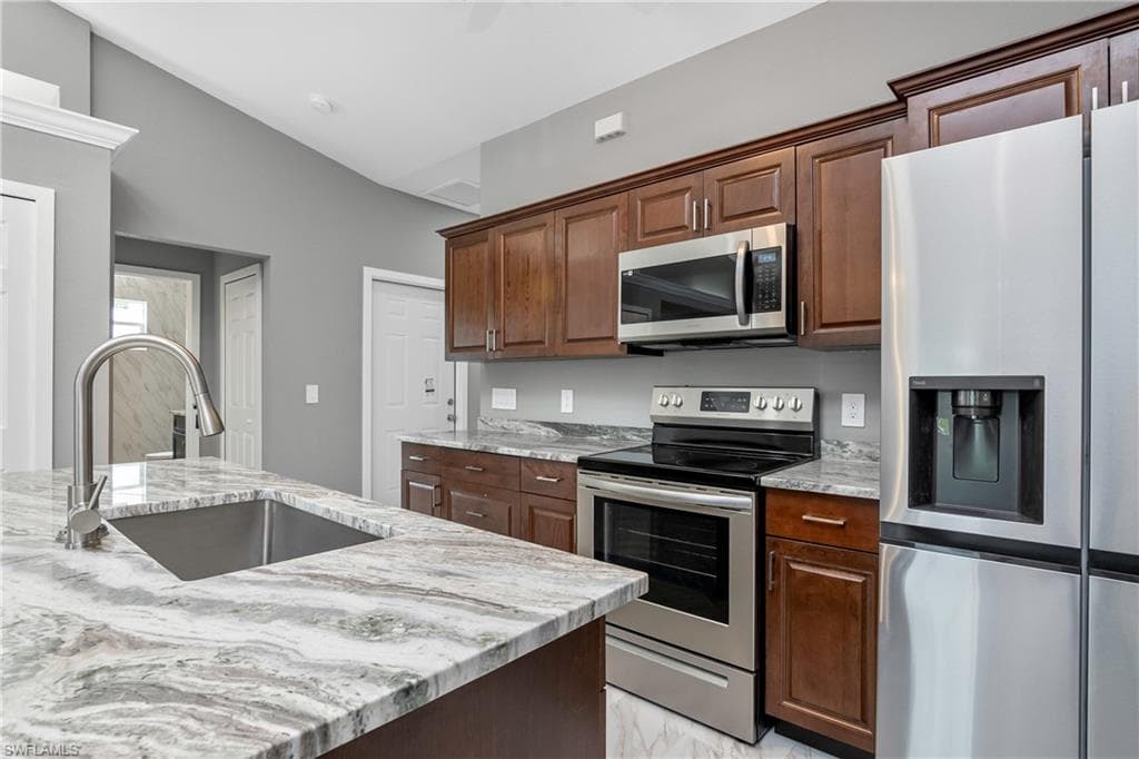 113-115 Gilbert Ave S, Lehigh Acres, FL 33973-4