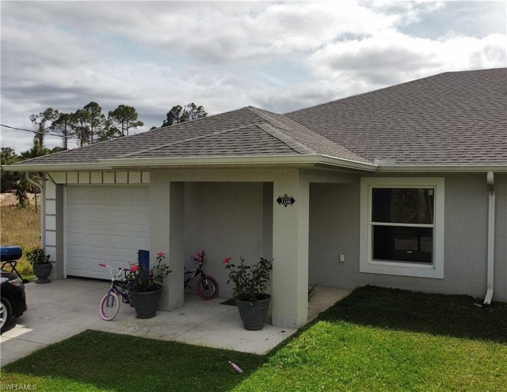 1114-1116 Augusta St E, Lehigh Acres, FL 33974-2