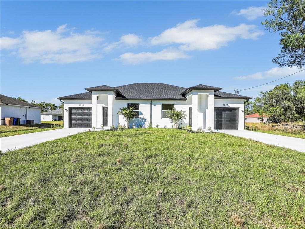 1025/1027 Meadow Rd, Lehigh Acres, FL 33973-2