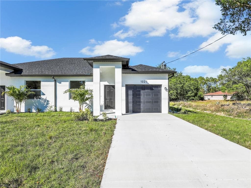 1025/1027 Meadow Rd, Lehigh Acres, FL 33973-3