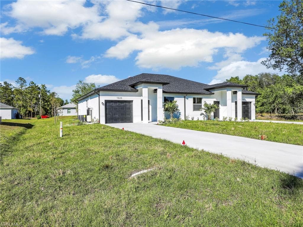 1025/1027 Meadow Rd, Lehigh Acres, FL 33973-6