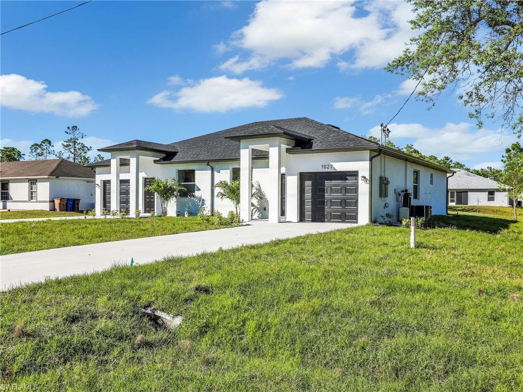 1025/1027 Meadow Rd, Lehigh Acres, FL 33973-7