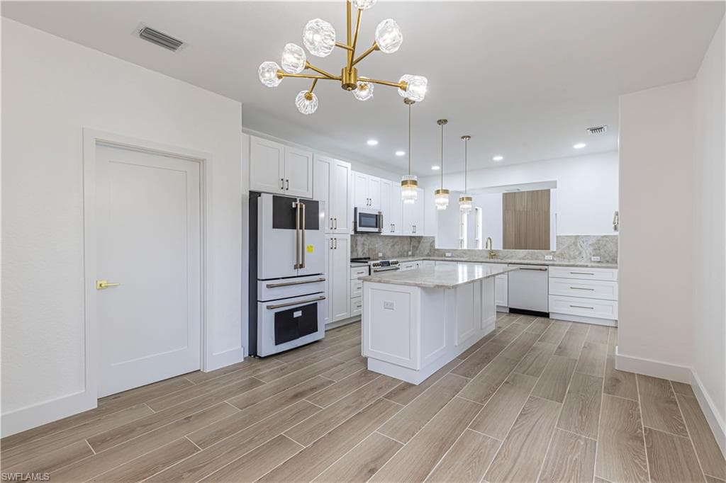 9217 Troon Lakes Dr, Naples, FL 34109-2