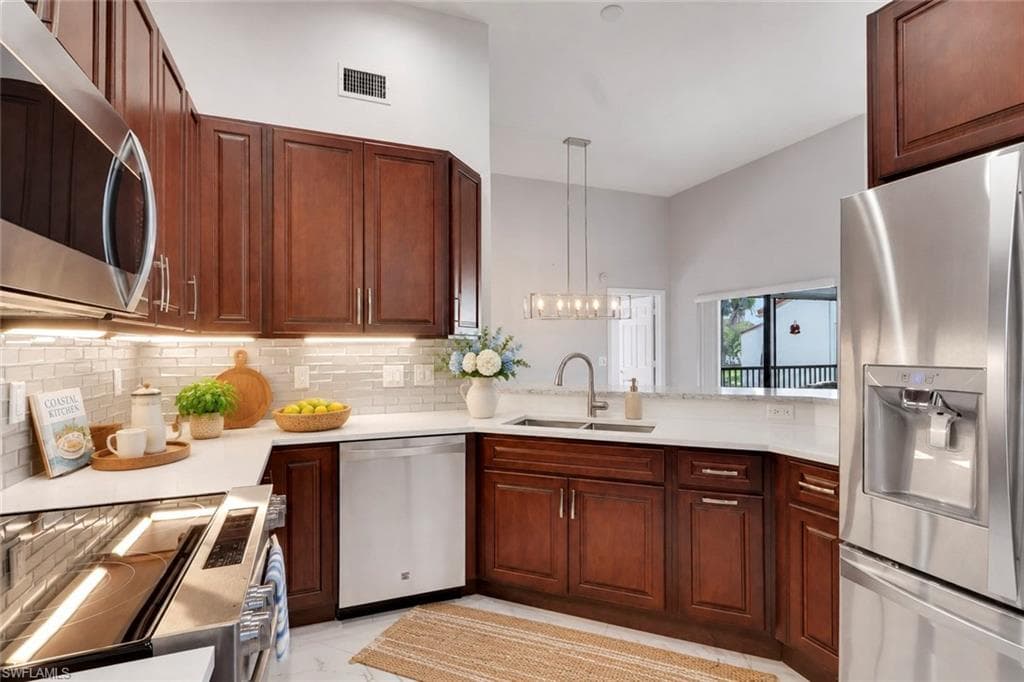 625 BEACHWALK CIR G203-9